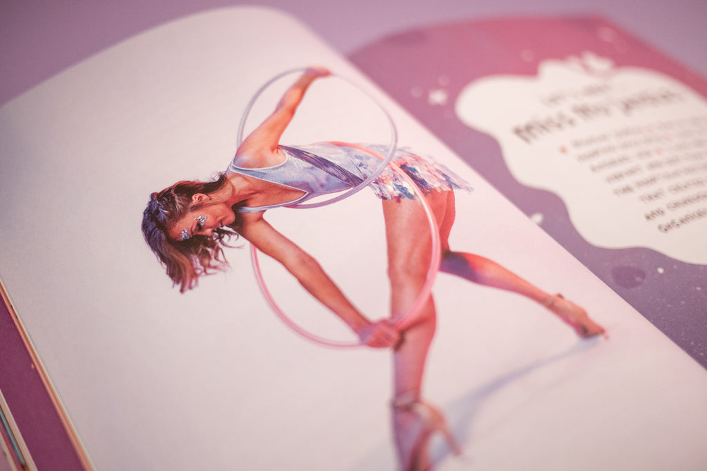 Inside pages of The Hoop Book by Hoop Hoop Hurray, featuring hoop dance tutorials, interviews, and inspiration for flow artists.